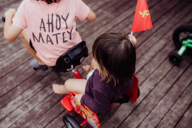20190416-DSC_1729 Top down image of little boy on the back of a bike with Perth family photographer