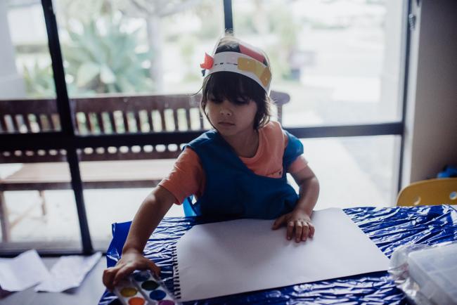 20190416-DSC_1738 Little boy with a paper crown sitting at a craft table about to paint with Perth family photographer