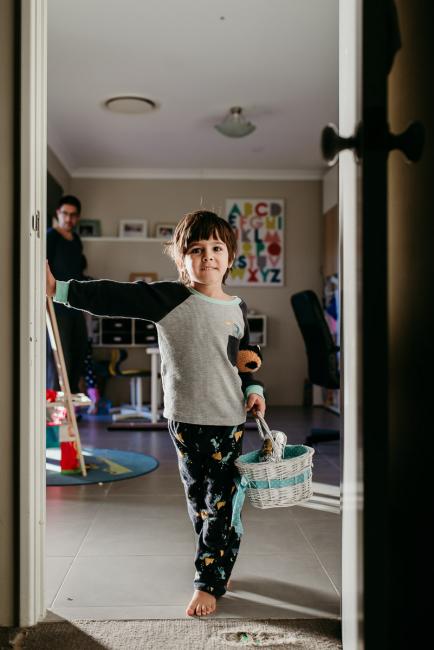 20190421-DSC_2020 Little boy standing in the doorway with his easter egg basket with family photographer Perth