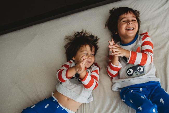 20190422-DSC_2515 Brothers laying on their backs and clapping with family photographer Perth