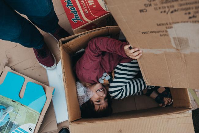 20190422-DSC_2811 Boy curled up smiling in a box with Perth family photographer
