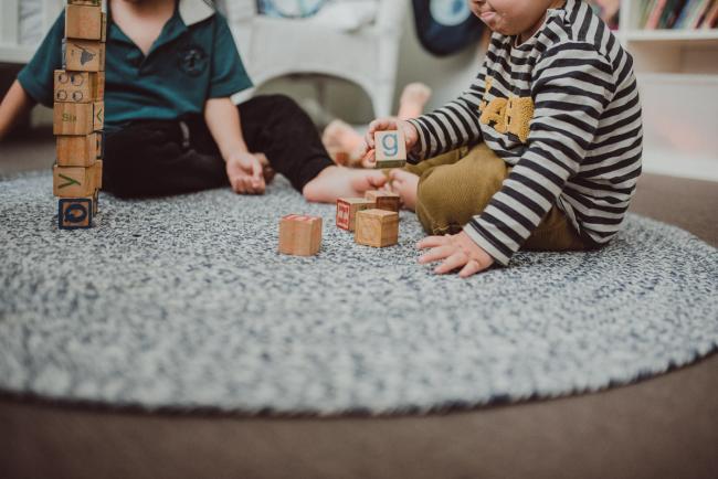 Two boys building blocks with Perth family photographer