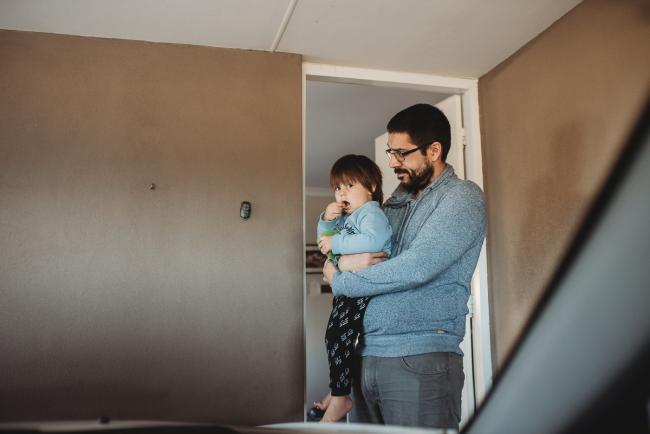 Father and son standing at the door with Perth lifestyle photographer
