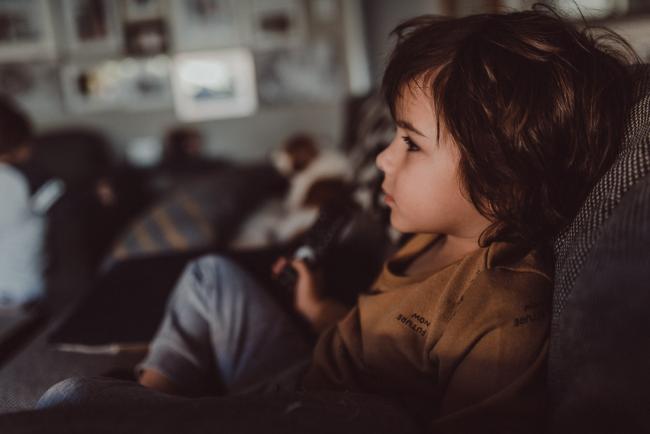 Little boy sitting on the couch with Perth lifestyle photographer