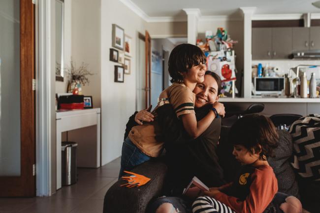 Boy hugging his mother with Family Photographer Perth