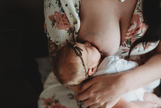 mother breastfeeding during a Perth Newborn photography session