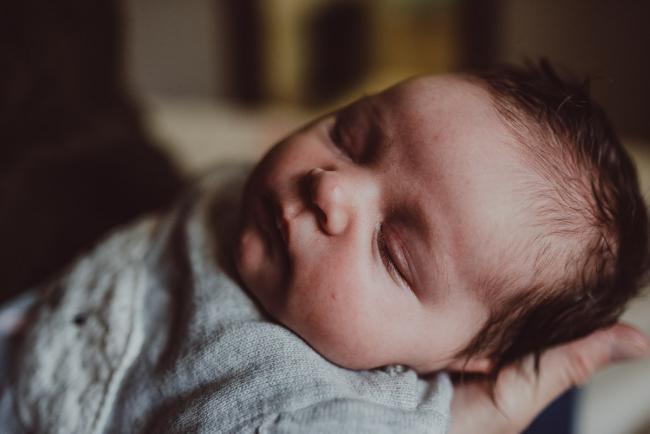 Newborn-Lifestyle-Photographer-Perth-50-of-54 Close up of baby face during a lifestyle newborn photography session in Perth