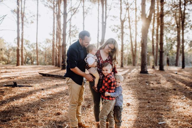 Family of 5 during a family photography Perth session at The Pines during golden hour