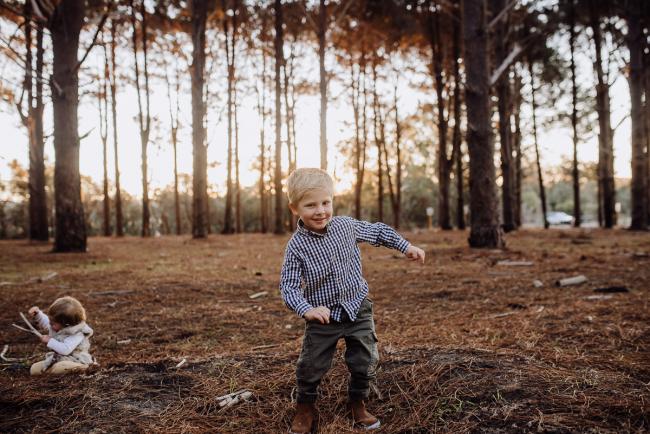 The-Pines-Family-Photographer-Perth-52-of-60 Little boy dancing during a Perth Family Photography session during Golden Hour at The Pines