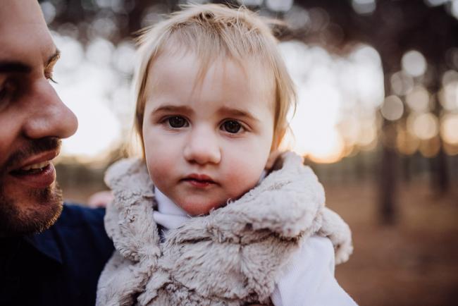 The-Pines-Family-Photographer-Perth-55-of-60 Father holding his daughter during a Perth Family Photography session during Golden Hour at The Pines