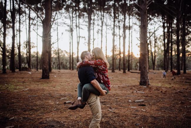 The-Pines-Family-Photographer-Perth-58-of-60 Husband lifting his wife during a Perth Family Photography session during Golden Hour at The Pines