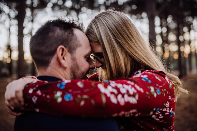 The-Pines-Family-Photographer-Perth-59-of-60 Couple touching foreheads during a Perth Family Photography session during Golden Hour at The Pines