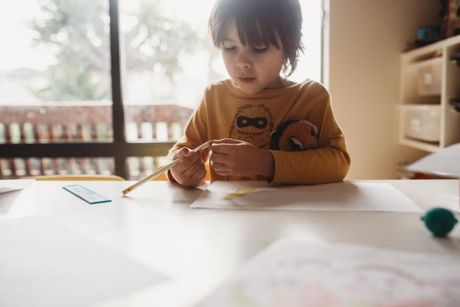 20190620-DSC_8053 Little boy sitting at a table drawing with Perth family photographer