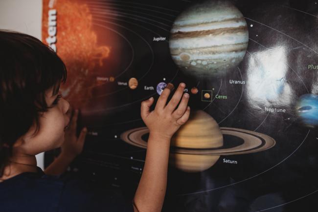 20190622-DSC_8120 Boy touching a planet poster with Perth family lifestyle photographer