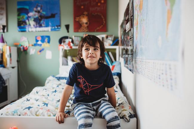 20190622-DSC_8151 Little boy sitting on the end of his bed with Perth family lifestyle photographer