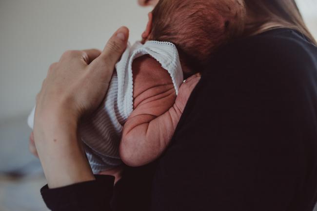 Close up of baby wrinkly arms during a Perth Fresh 48 photography session captured in home