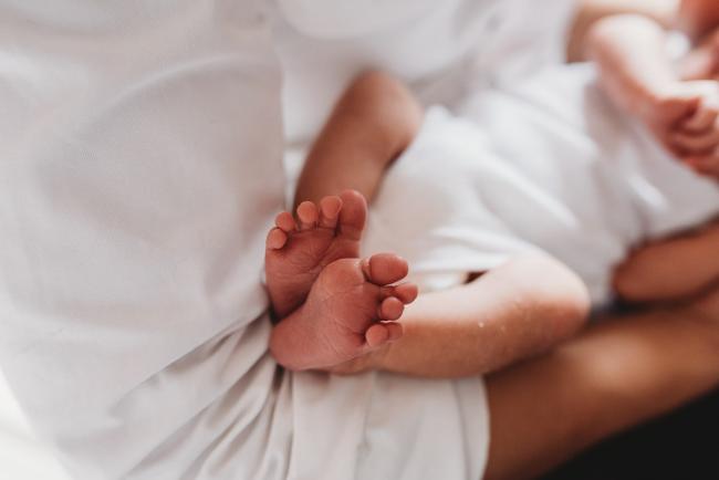 Close up of baby's feet during an in-home Perth Newborn Lifestyle photography session