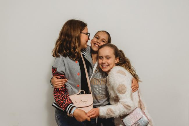 Perth-Family-Photographer-11-of-13 Three girls hugging with Perth family photographer