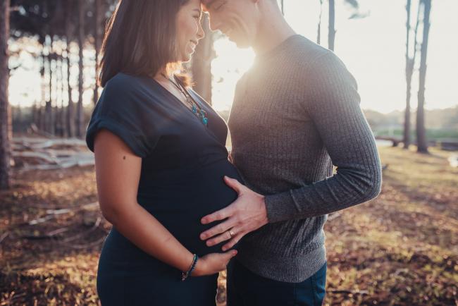 Perth-Maternity-Photographer-The-Pines-14-of-48 Pregnant couple touching foreheads with Perth maternity photographer at The Pines