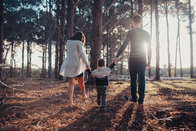 Perth-Maternity-Photographer-The-Pines-2-of-48 Family of three walking away holding hands with Perth maternity photographer at The Pines