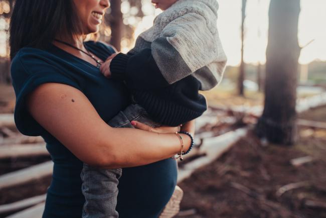 Perth-Maternity-Photographer-The-Pines-22-of-48 Close up of toddler on his pregnant mum's tummy with Perth maternity photographer at The Pines