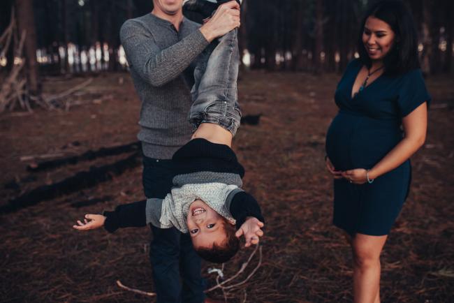 Perth-Maternity-Photographer-The-Pines-31-of-48 Father hanging his son upside down with Perth maternity photographer at The Pines