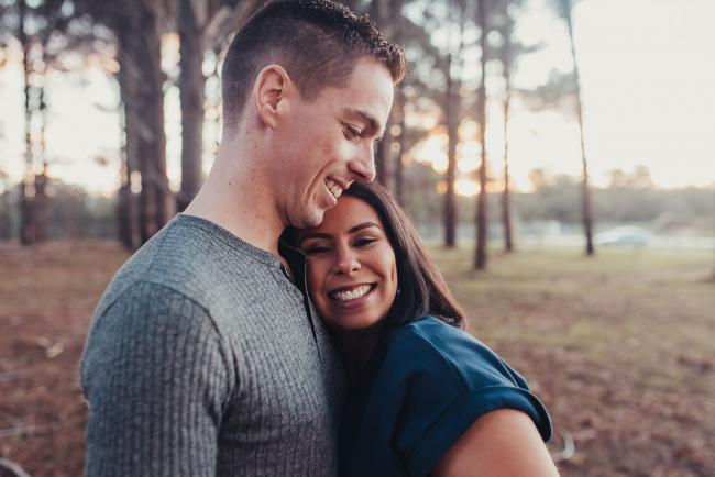 Perth-Maternity-Photographer-The-Pines-36-of-48 Close up of woman resting her head on partner's chest with Perth couple photographer at The Pines