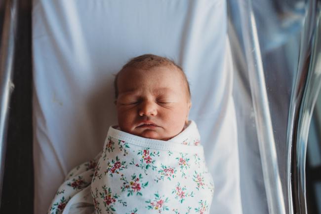 New baby in wrap during a Perth Fresh 48 photography session at SJOG Mt Lawley