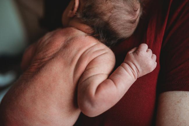 Close up of shoulder and arms of new baby during a Perth Fresh 48 photography session at SJOG Mt Lawley