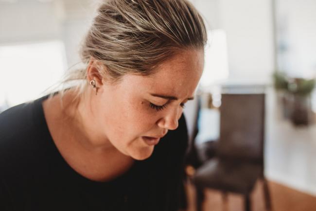 Pregnant woman breathing through a contraction with Perth Birth Photographer
