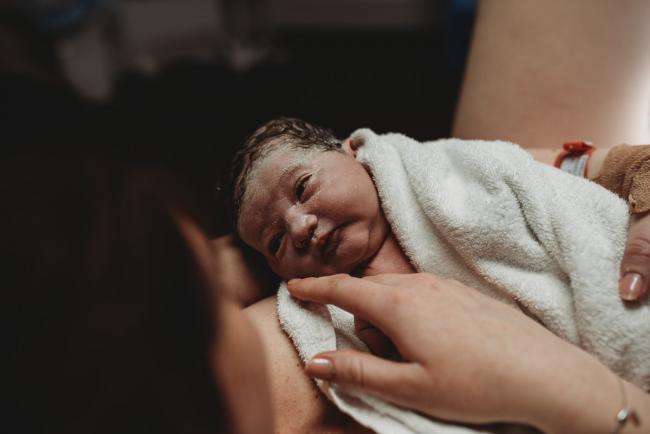 Birth-Photographer-Perth-3-of-60 Newborn baby looking at mother with Perth Birth Photographer at SJOG Mt Lawley