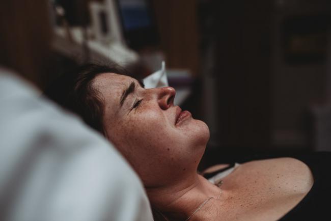 Close up of pregnant woman during contraction with Birth Photographer Perth at SJOG Mt Lawley