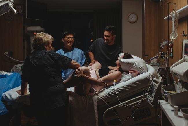 Birth-Photographer-Perth-54-of-60 Pregnant woman starting to push with Perth Birth Photographer at SJOG Mt Lawley
