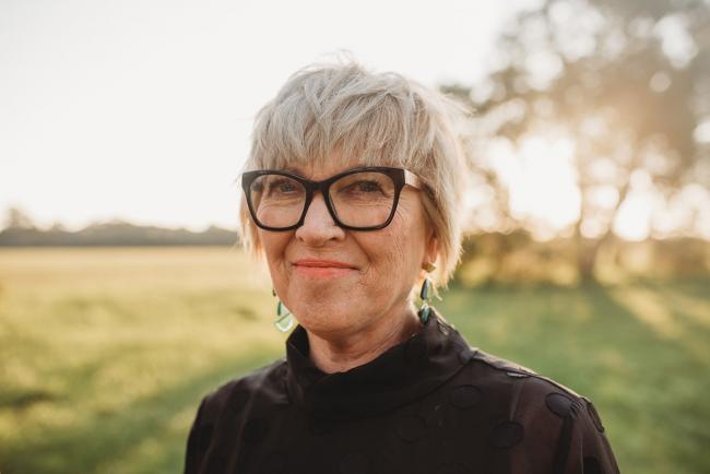 Woman looking at the camera during Perth family photography session at Perry's Paddock during golden hour