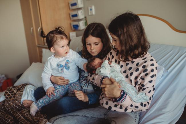 Newborn-and-Fresh-48-Photographer-Perth-SJOG-Mt-Lawley-17-of-51 Sisters holding new baby sister and younger sister with Perth Fresh 48 photographer at SJOG Mt Lawley