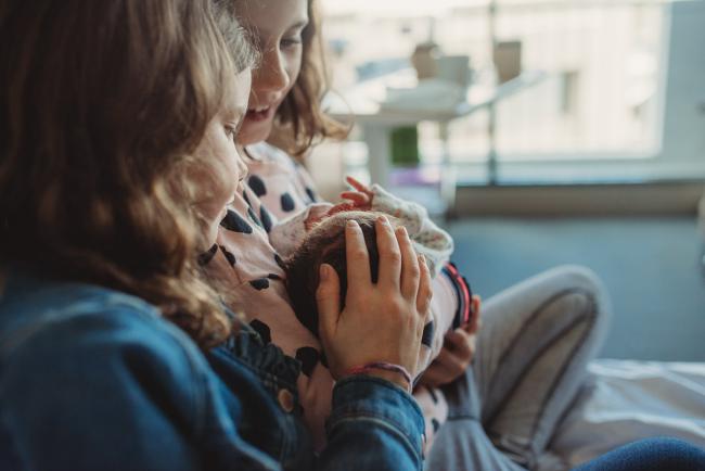 Newborn-and-Fresh-48-Photographer-Perth-SJOG-Mt-Lawley-20-of-51 sister holding head of new baby with Perth Fresh 48 photographer at SJOG Mt Lawley