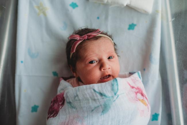 Newborn-and-Fresh-48-Photographer-Perth-SJOG-Mt-Lawley-44-of-51 baby eyes open in bassinet with Perth Fresh 48 photographer at SJOG Mt Lawley