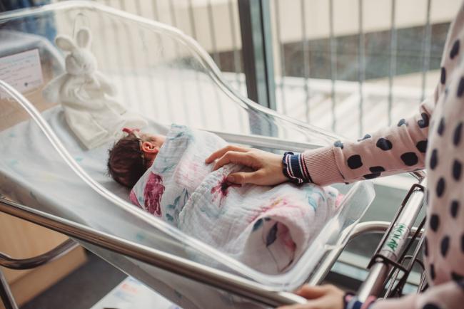 Newborn-and-Fresh-48-Photographer-Perth-SJOG-Mt-Lawley-46-of-51 Big sister's hand on baby sister in bassinet with Perth Fresh 48 photographer at SJOG Mt Lawley