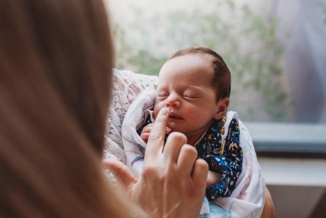 Perth-Newborn-Photographer-16-of-60-1 Mother touching new baby's nose with Perth newborn lifestyle photographer