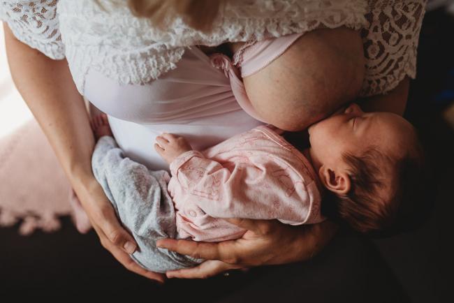 Perth-Newborn-Photographer-35-of-60 Newborn baby breastfeeding with Perth newborn lifestyle photographer