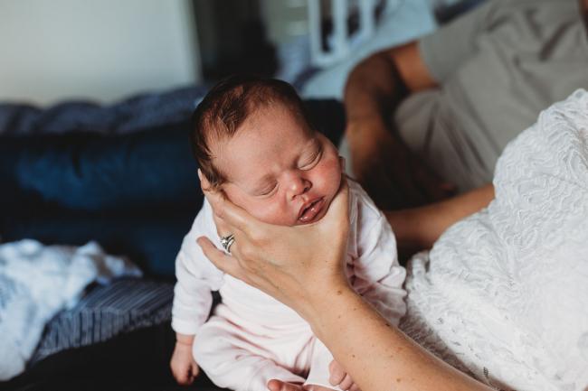 Perth-Newborn-Photographer-49-of-60 Newborn baby being burped with Perth newborn lifestyle photographer