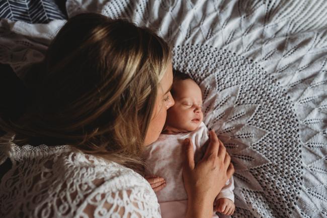 Perth-Newborn-Photographer-56-of-60 Mother kissing newborn baby with Perth newborn lifestyle photographer