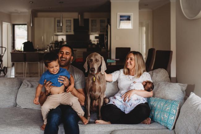 Perth-Newborn-Photographer-59-of-60-1 Family of four and dog on couch with Perth newborn lifestyle photographer