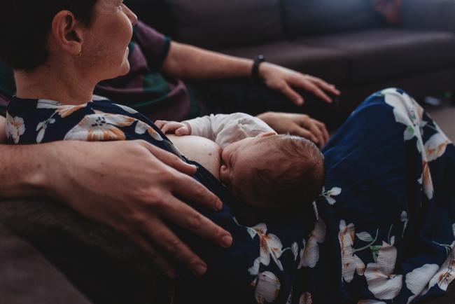 Baby breastfeeding with Perth newborn lifestyle photographer
