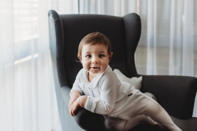 Little boy on chair with Perth Events Photographer