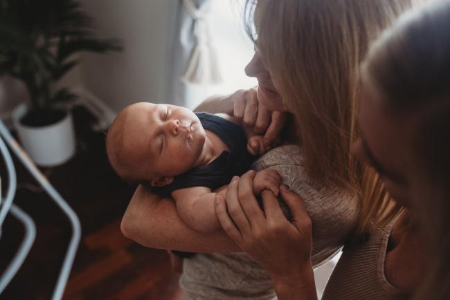 Lifestyle-Newborn-Photographer-Perth-21-of-69 Mother and grandmother standing with sleeping newborn baby with in-home lifestyle newborn photographer Perth