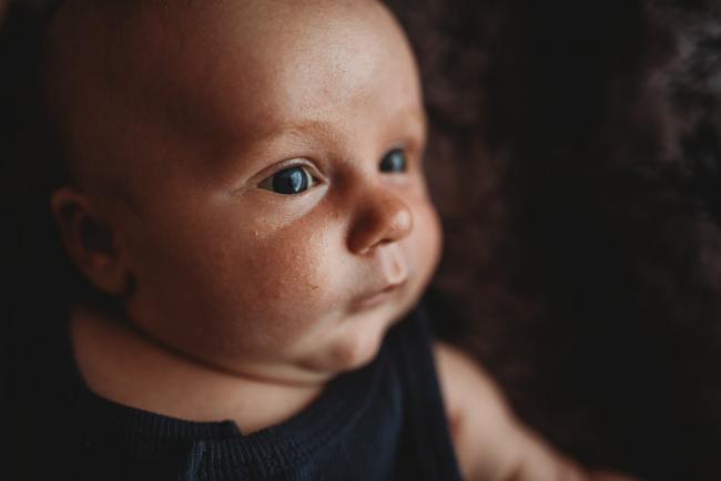 Lifestyle-Newborn-Photographer-Perth-58-of-69 close up of newborn baby face with Perth lifestyle newborn photographer