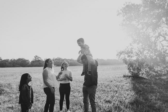 black and white image of family during Perth family photographer session at Perry's Paddock