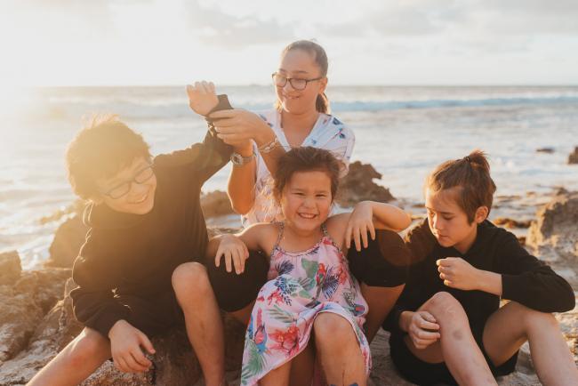 Family-Photographer-Perth-Burns-Beach-21-of-57 Four siblings on the beach at Burns Beach with Perth Family Photographer