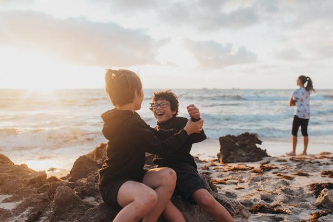 Family-Photographer-Perth-Burns-Beach-27-of-57 brothers playing at Burns Beach with Perth Family Photographer